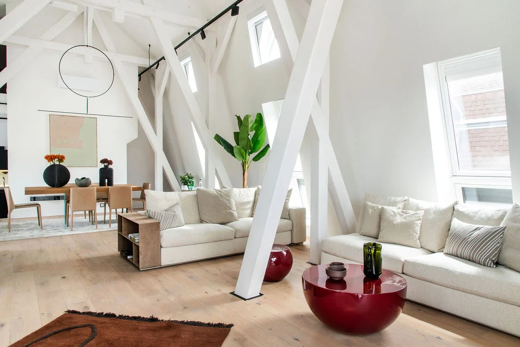 Luxury penthouse living room with white beams, József Nádor Square